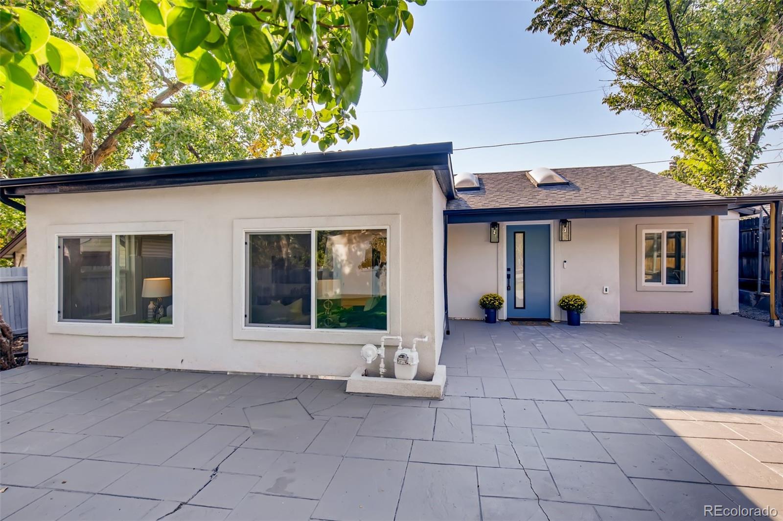2925 Eaton Street Wheat Ridge, CO 80214 - Photo 2 of 30 a view of a house with a patio
