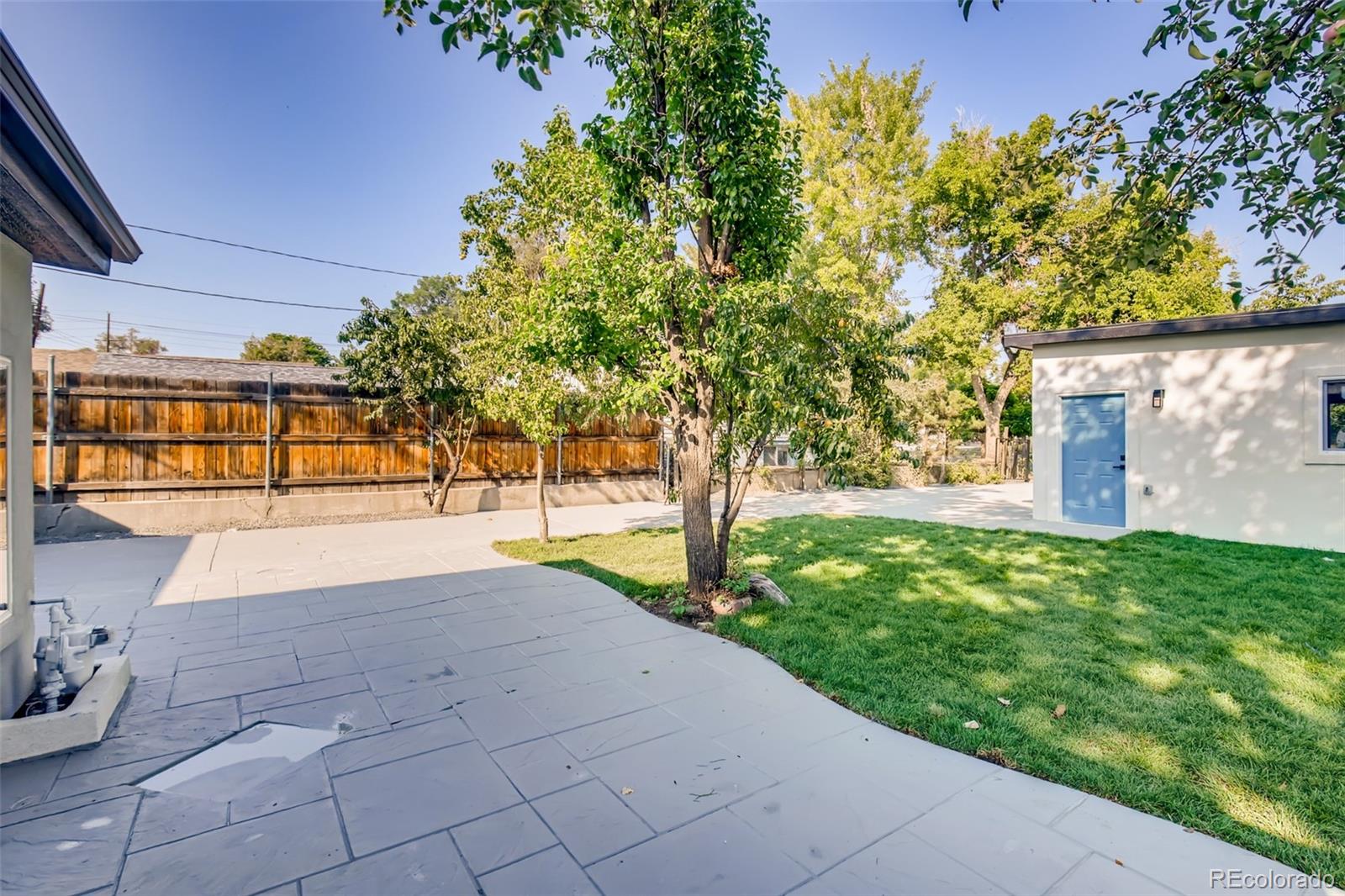 2925 Eaton Street Wheat Ridge, CO 80214 - Photo 28 of 30 a view of yard with tree in the background