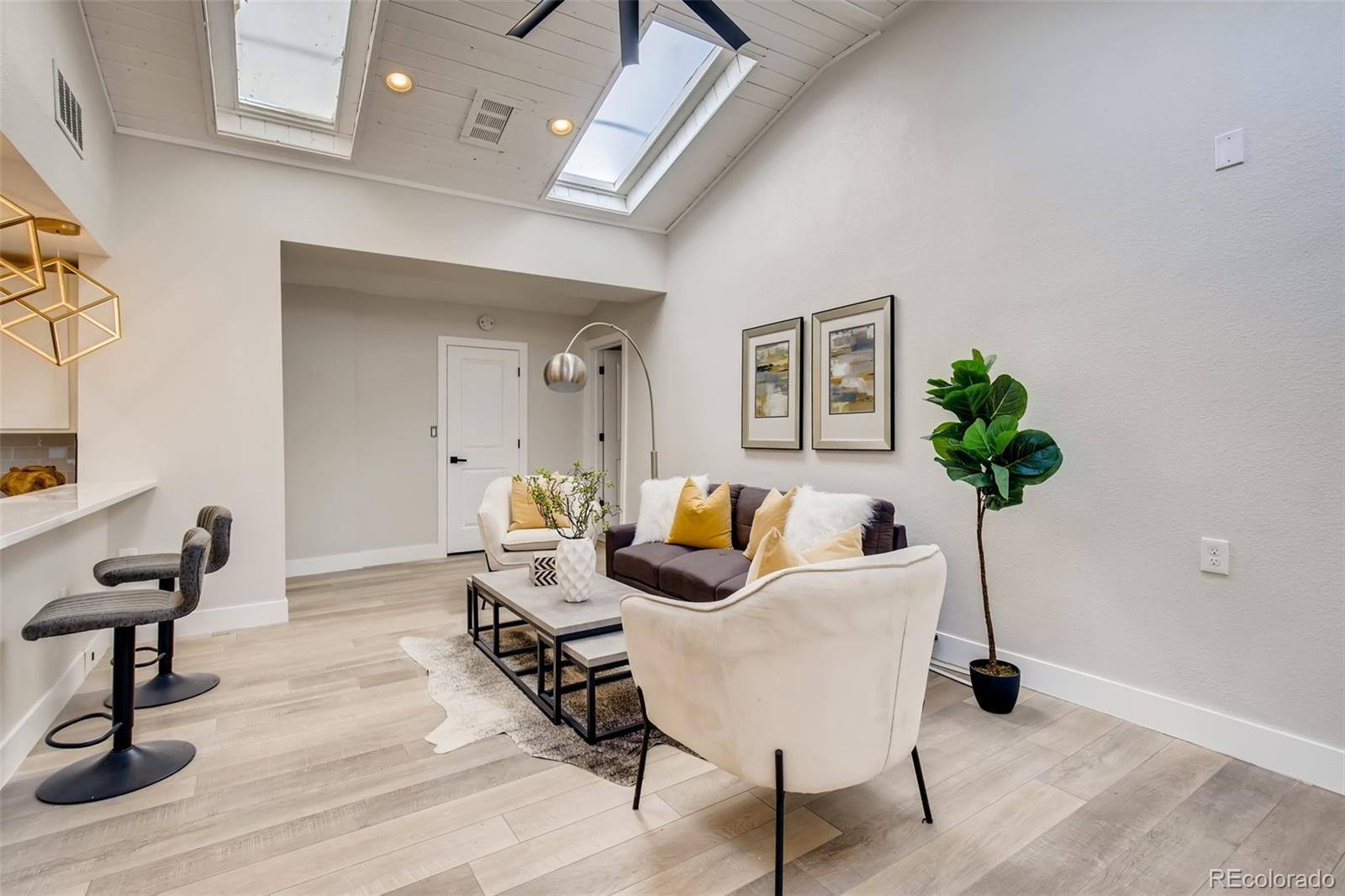 2925 Eaton Street Wheat Ridge, CO 80214 - Photo 7 of 30 a living room with furniture