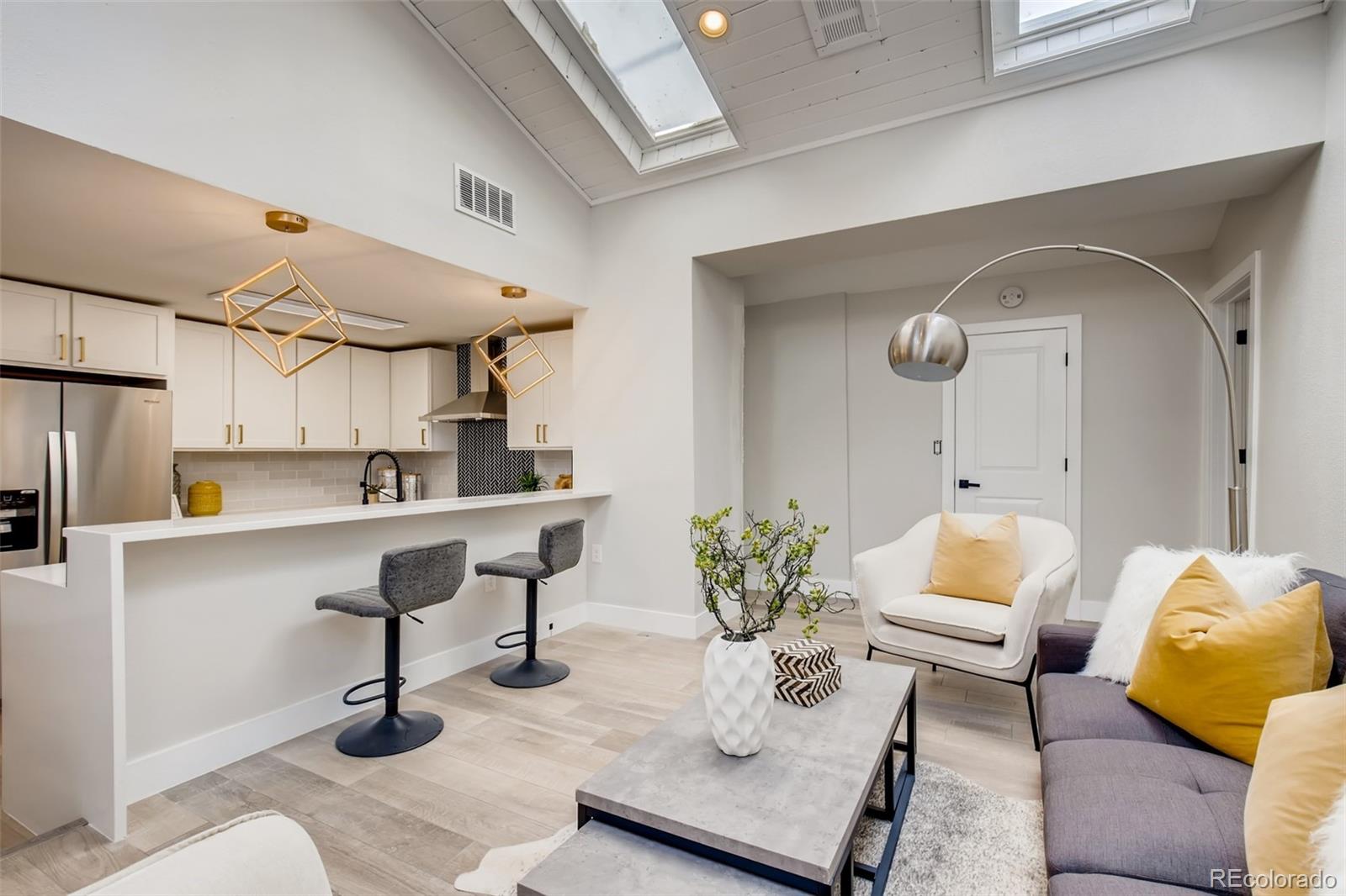 2925 Eaton Street Wheat Ridge, CO 80214 - Photo 8 of 30 a living room with furniture