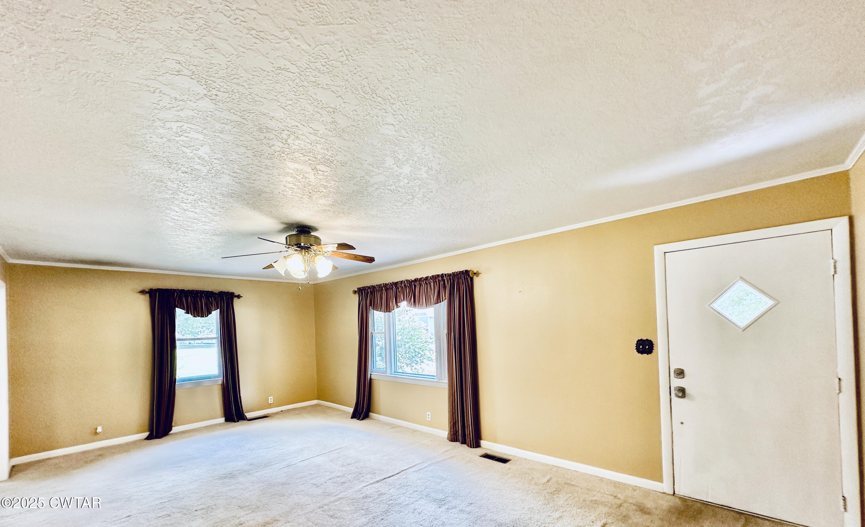 502 West Main Street Rutherford, TN 38369 - Photo 13 of 34 a view of an empty room with window and cabinet