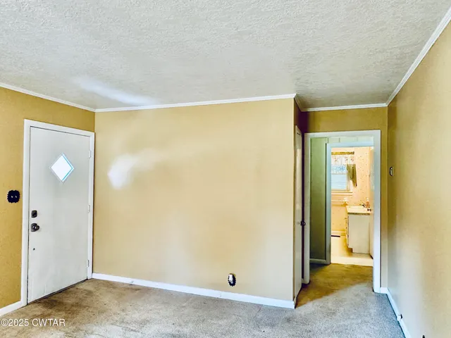 a view of a big room with a wardrobe space