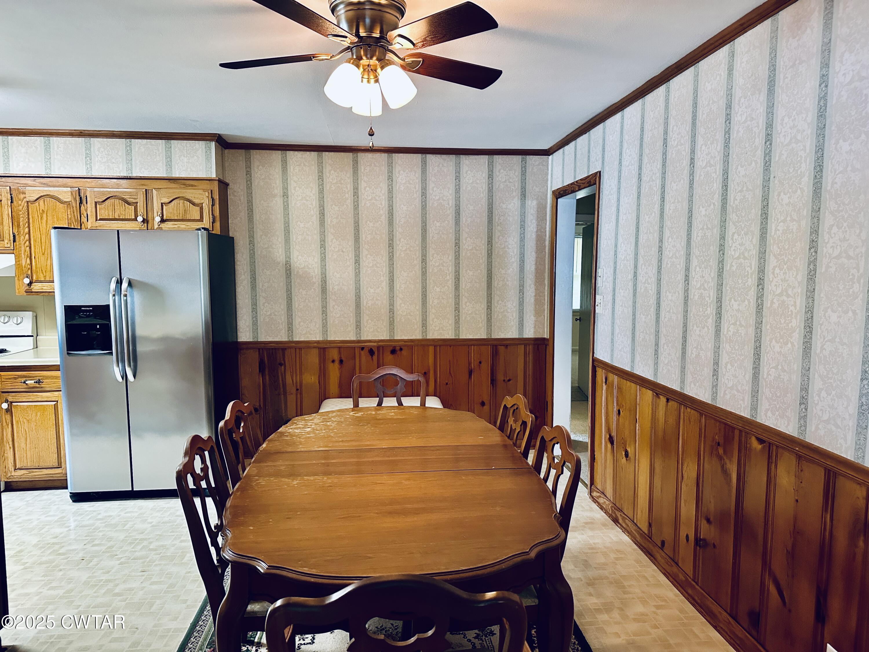 502 West Main Street Rutherford, TN 38369 - Photo 22 of 34 a view of a dining room with furniture and chandelier