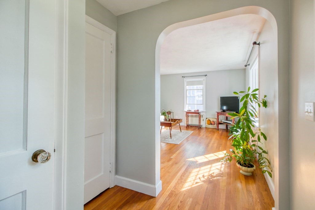 29 Harkness Avenue Springfield, MA 01118 - Photo 3 of 18 a view of livingroom with furniture and floor to ceiling window
