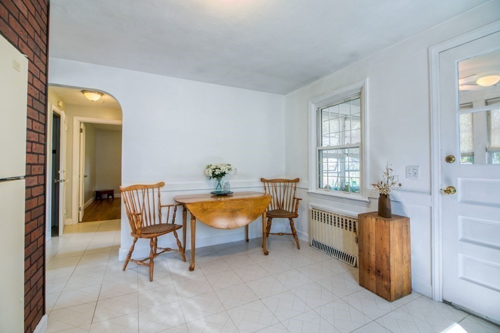 29 Harkness Avenue Springfield, MA 01118 - Photo 7 of 18 a balcony with chairs and a table