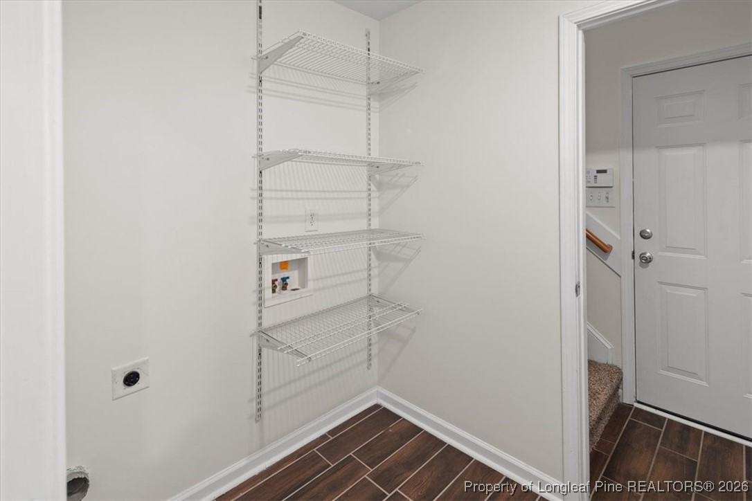 6649 Hillbrook Road Hope Mills, NC 28348 - Photo 29 of 37 a view of storage and utility room with racks on the wall