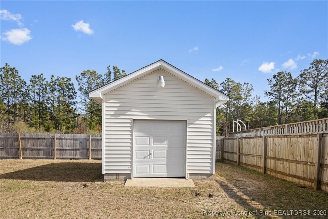 6649 Hillbrook Road Hope Mills, NC 28348 - Photo 34 of 37 a front view of a house with a yard