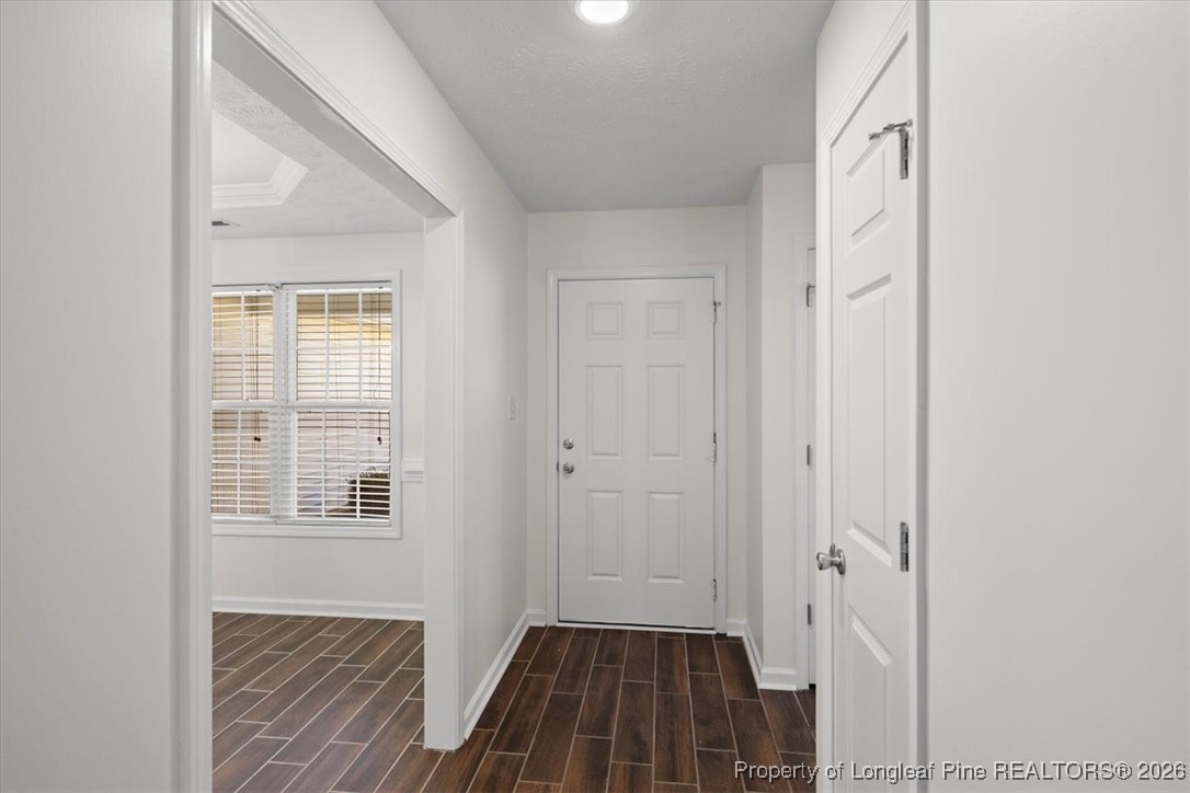 6649 Hillbrook Road Hope Mills, NC 28348 - Photo 6 of 37 a view of a livingroom with wooden floor and a window