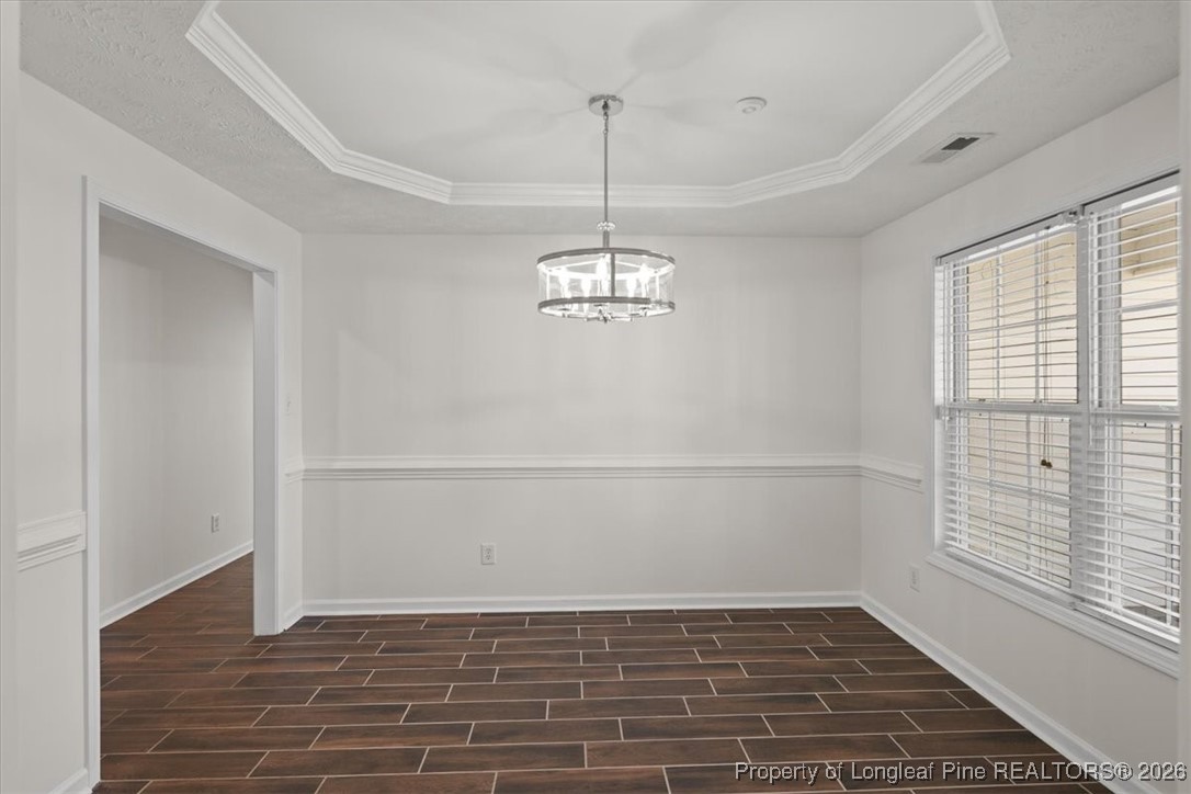 6649 Hillbrook Road Hope Mills, NC 28348 - Photo 7 of 37 a view of a room with window and wooden floor