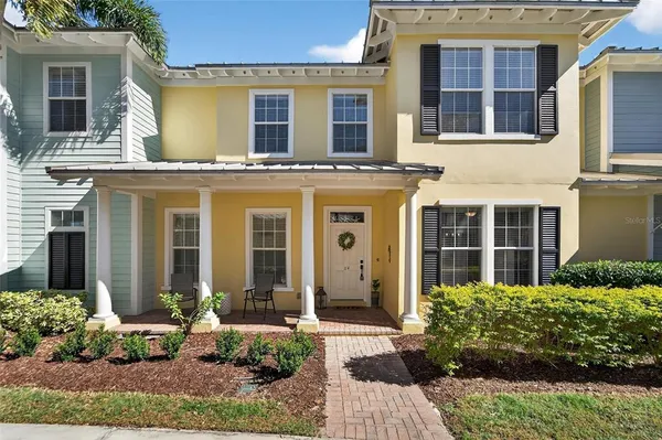a kitchen with stainless steel appliances granite countertop a refrigerator stove microwave and sink
