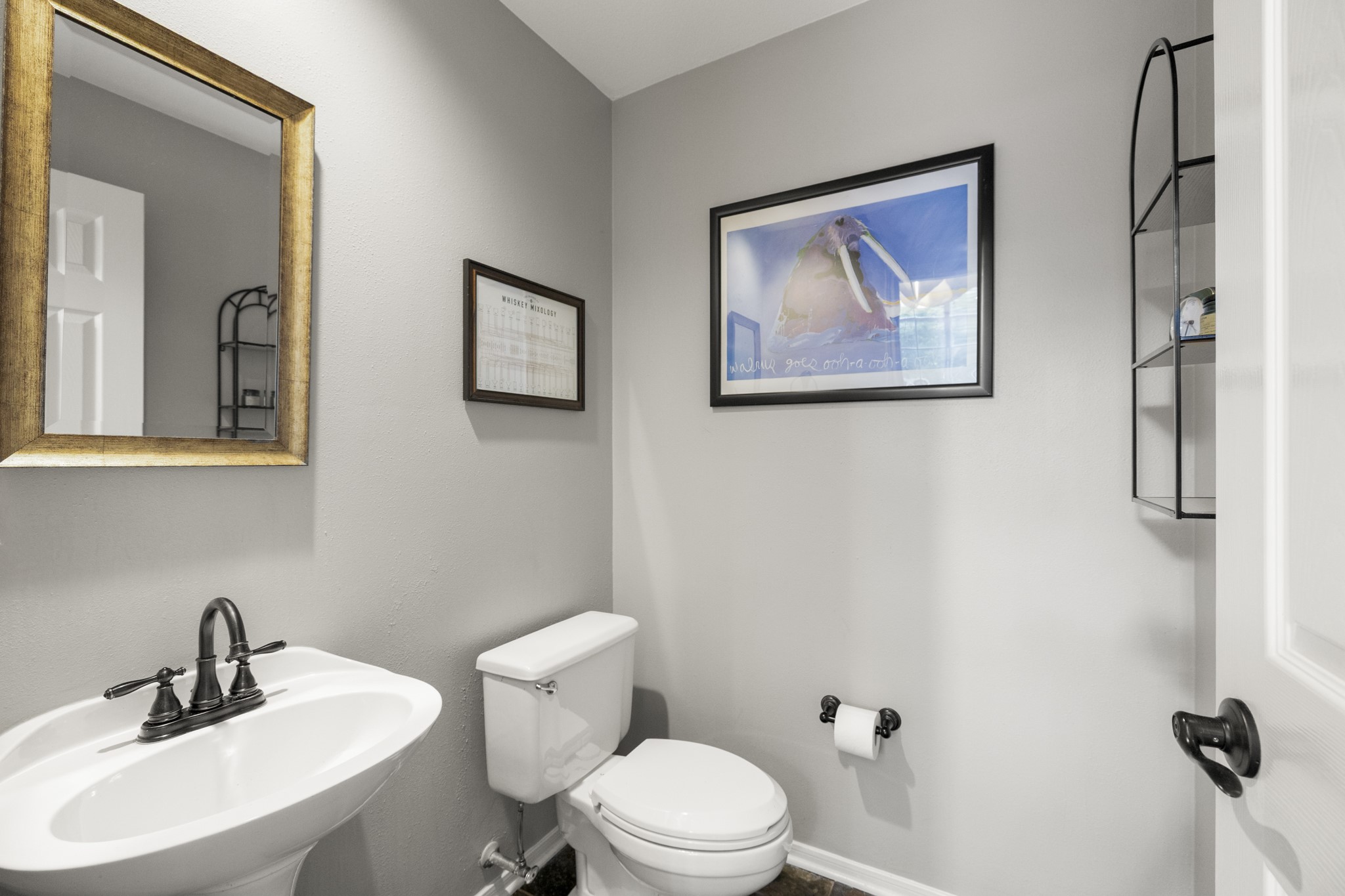 102 Treescape Circle Spring, TX 77381 - Photo 17 of 40 First-floor half bath near the living room.