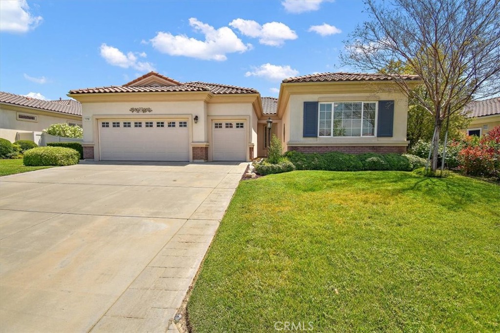 1730 Snowberry Road Beaumont, CA 92223 - Photo 1 of 1 a view of a house with a yard