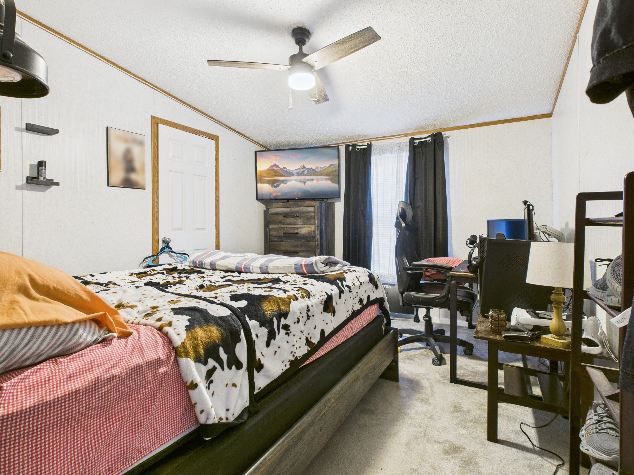 59 Spring Road Morrison, TN 37357 - Photo 13 of 18 a bed sitting in a bedroom next to a window