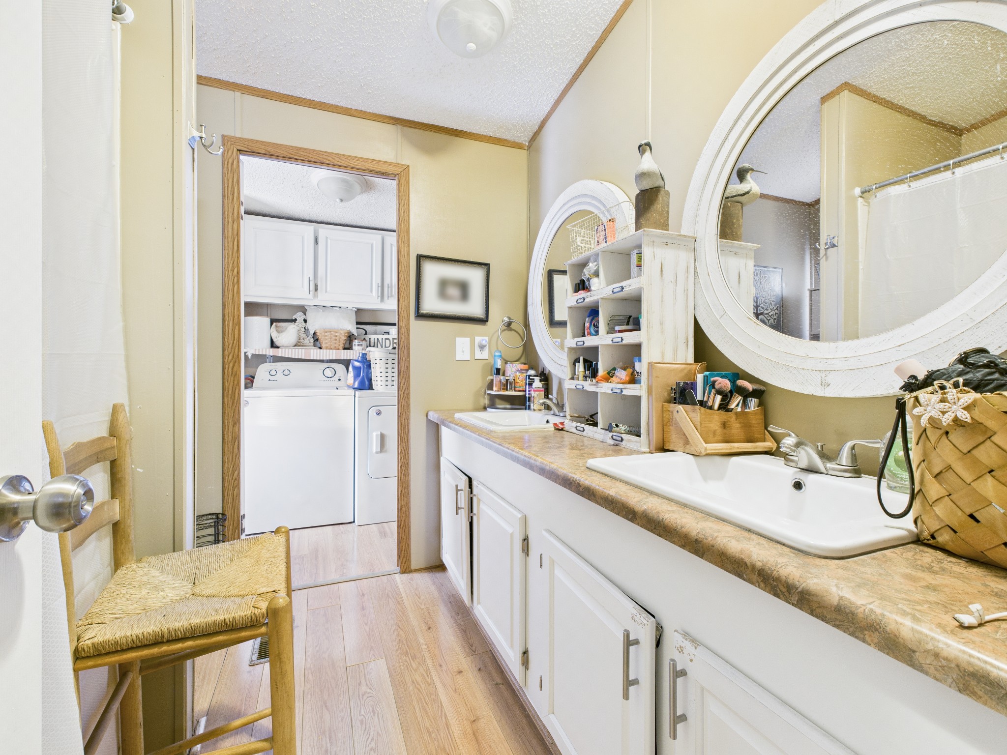 59 Spring Road Morrison, TN 37357 - Photo 16 of 18 a bathroom with double vanity sinks and a mirror