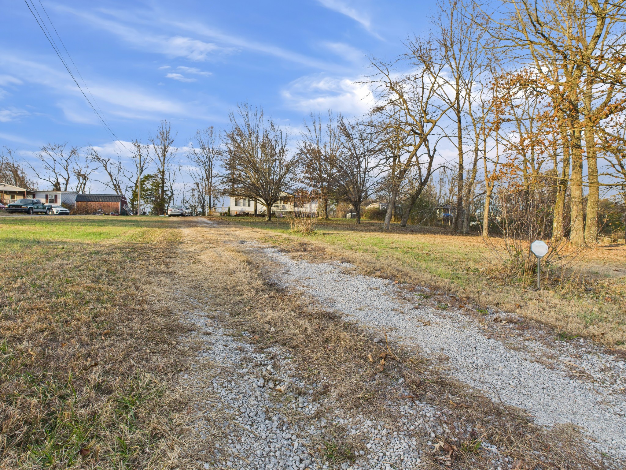 59 Spring Road Morrison, TN 37357 - Photo 3 of 18 a view of a field with trees in the background