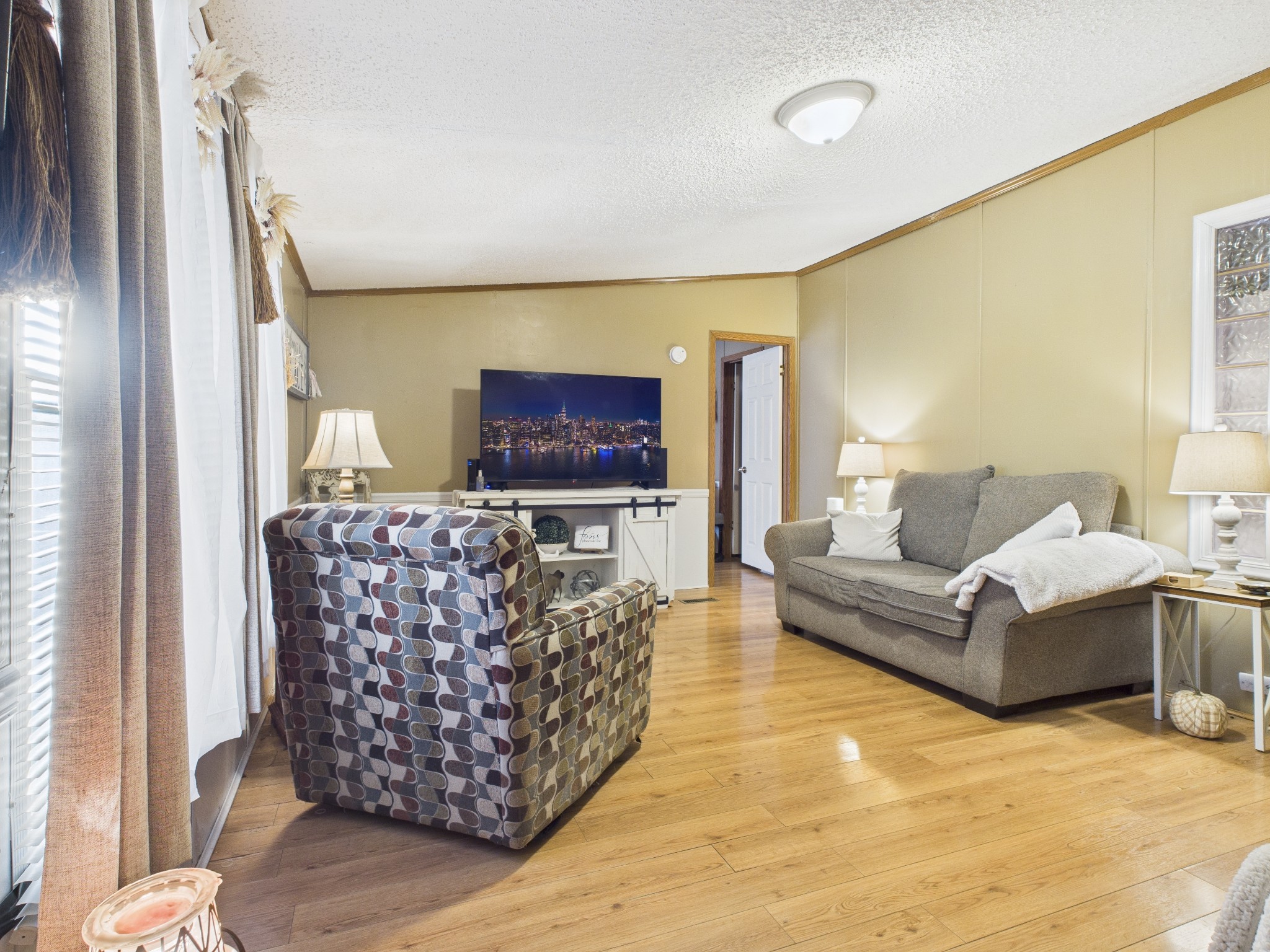 59 Spring Road Morrison, TN 37357 - Photo 5 of 18 a living room with furniture and a flat screen tv
