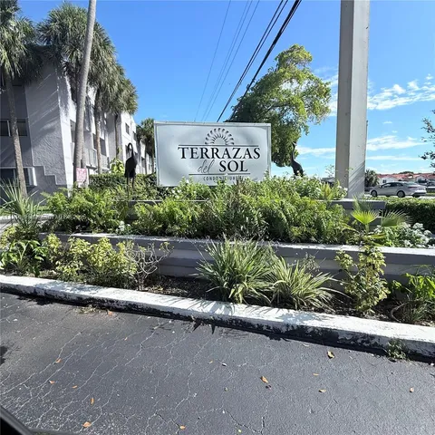a street sign on the side of a building