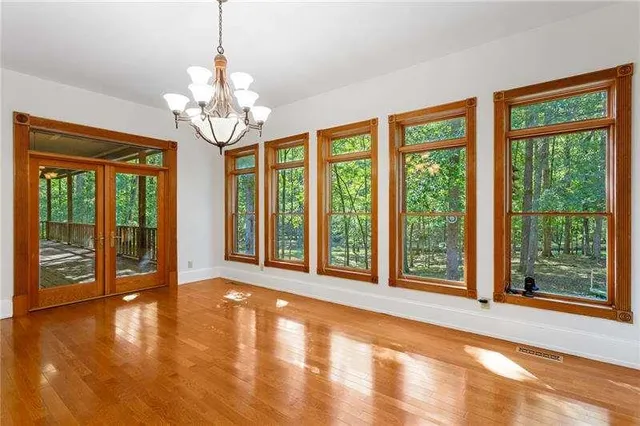 a view of porch with wooden floor and outdoor space