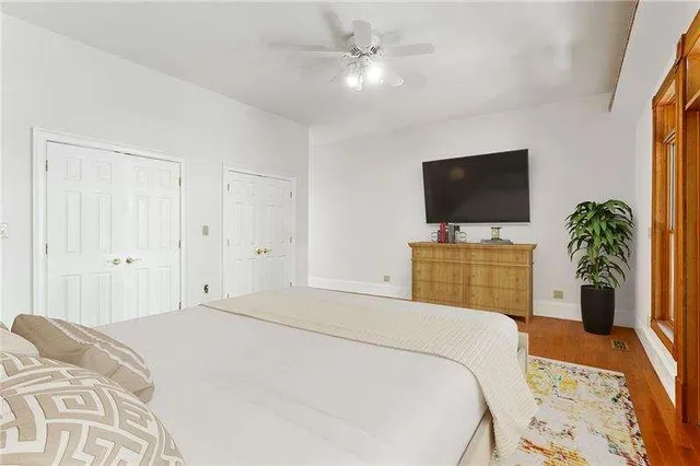 a bathroom with a shower sink and mirror