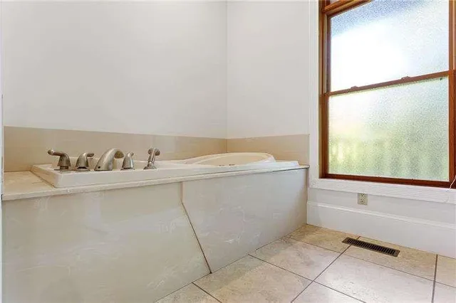 a view of a backyard with seating area