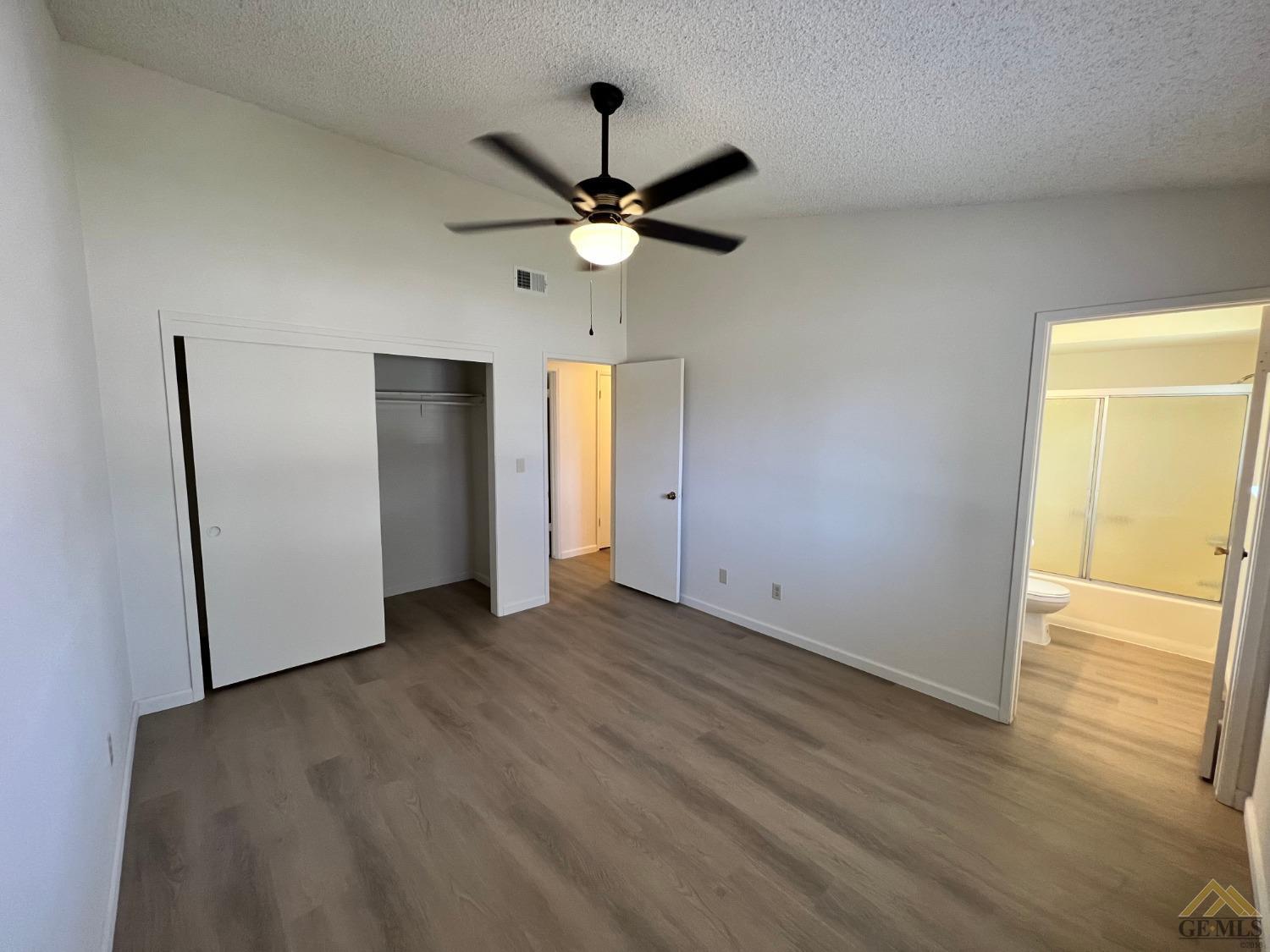Undisclosed Address Wasco, CA 93280 - Photo 12 of 17 a view of empty room with wooden floor
