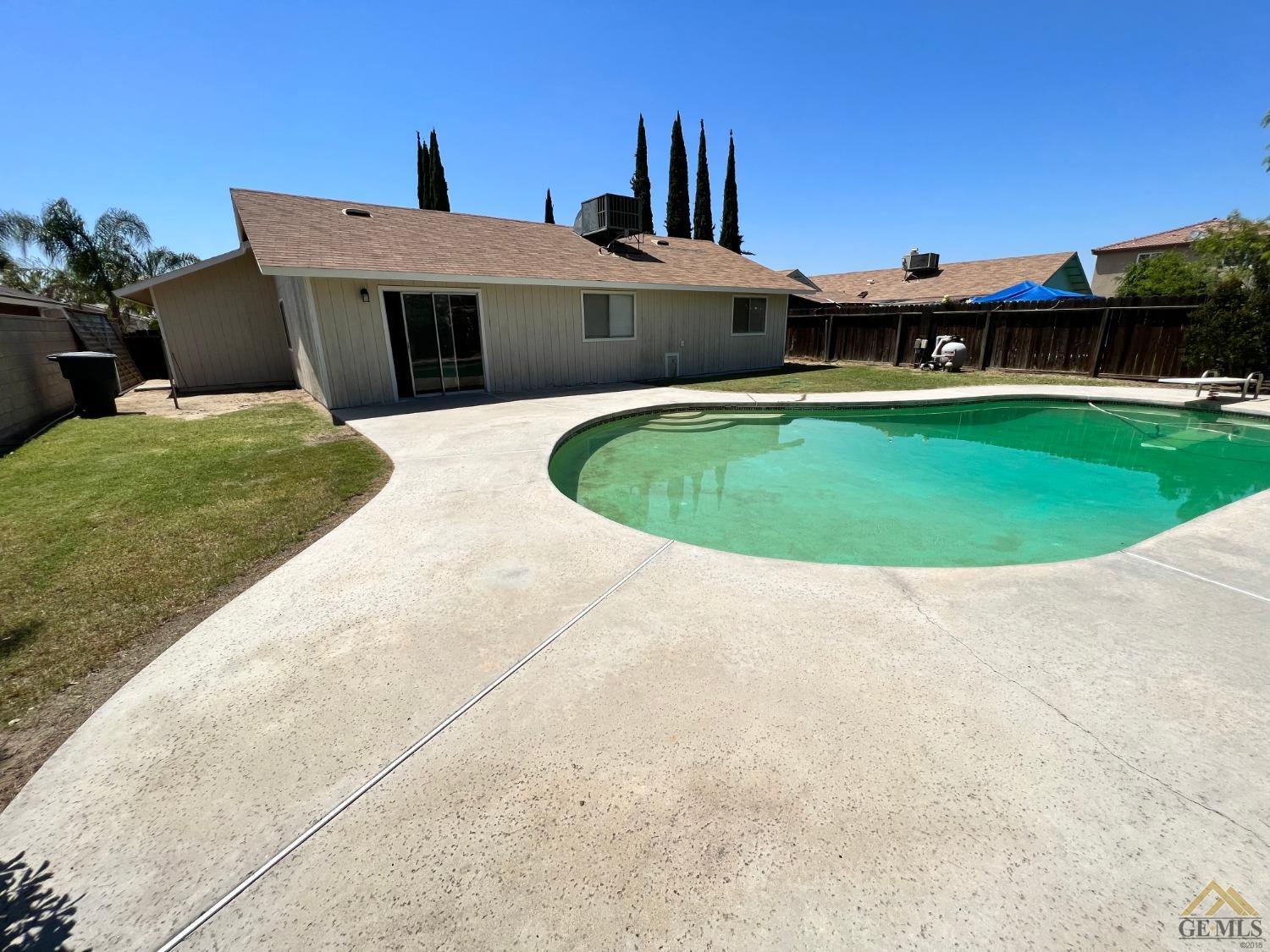 Undisclosed Address Wasco, CA 93280 - Photo 15 of 17 a view of a house with a backyard porch and sitting area
