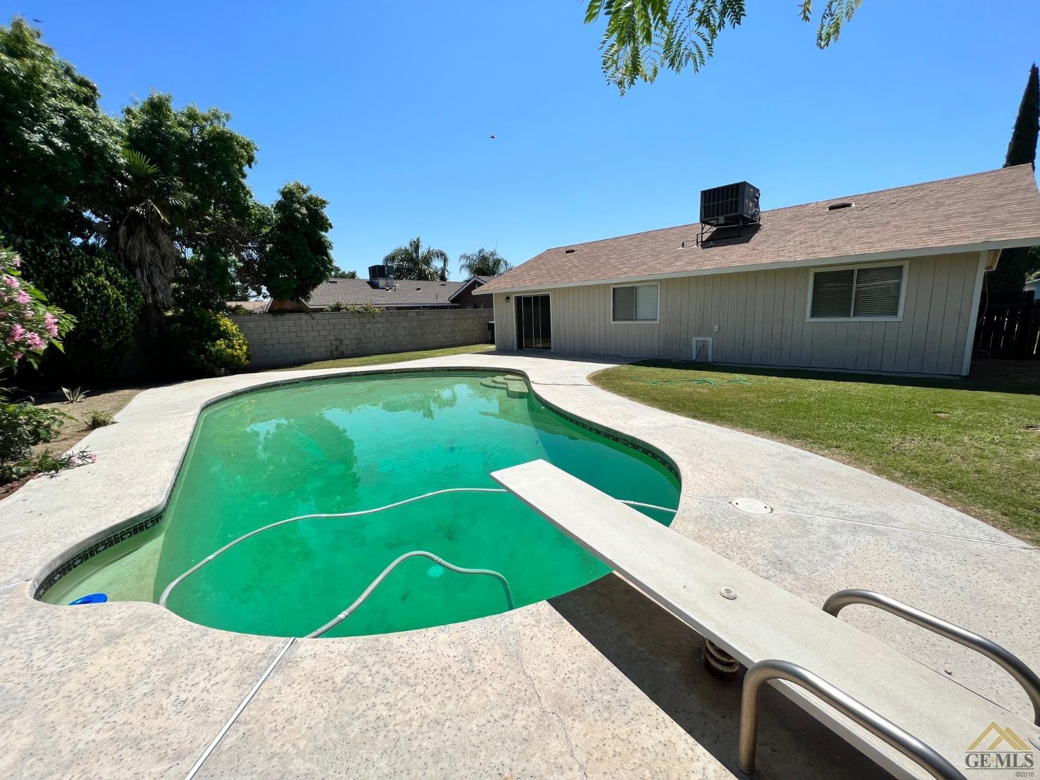 Undisclosed Address Wasco, CA 93280 - Photo 17 of 17 a view of a backyard with a house