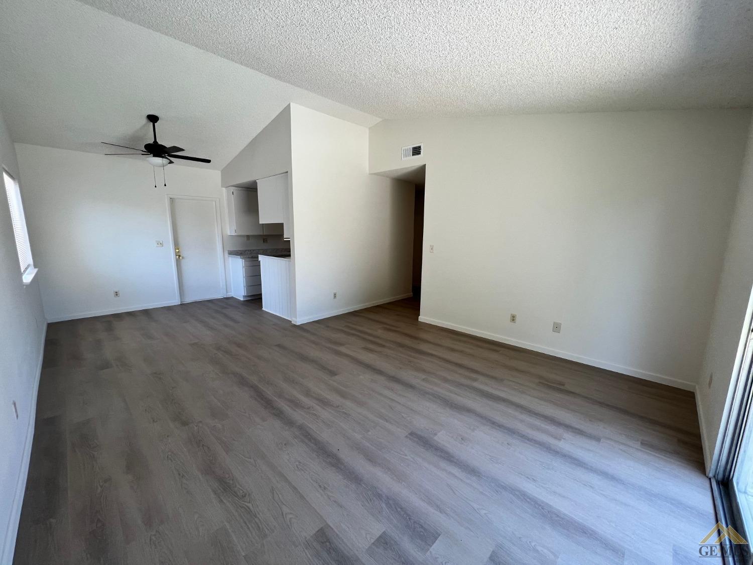 Undisclosed Address Wasco, CA 93280 - Photo 8 of 17 a view of a room with wooden floor