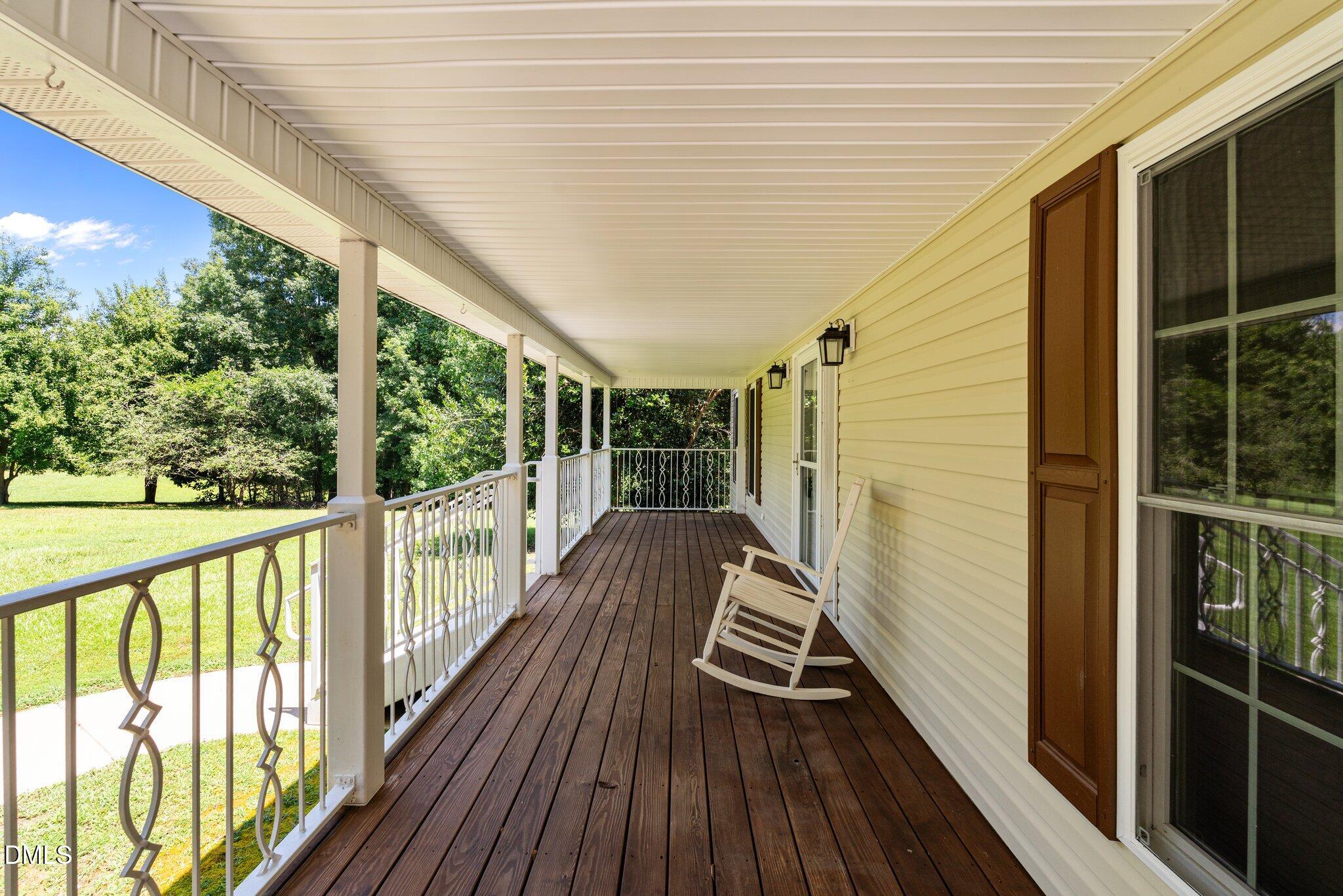 431 Patterson Ridge Lane Sanford, NC 27330 - Photo 27 of 29 a view of deck with wooden floor and outdoor seating