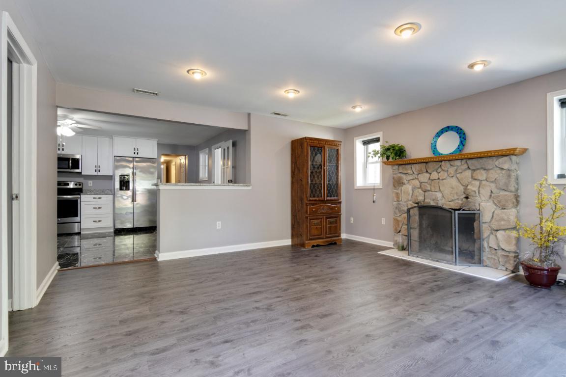 7845 Elizabeth Road Pasadena, MD 21122 - Photo 3 of 36 Living room beautiful new floors