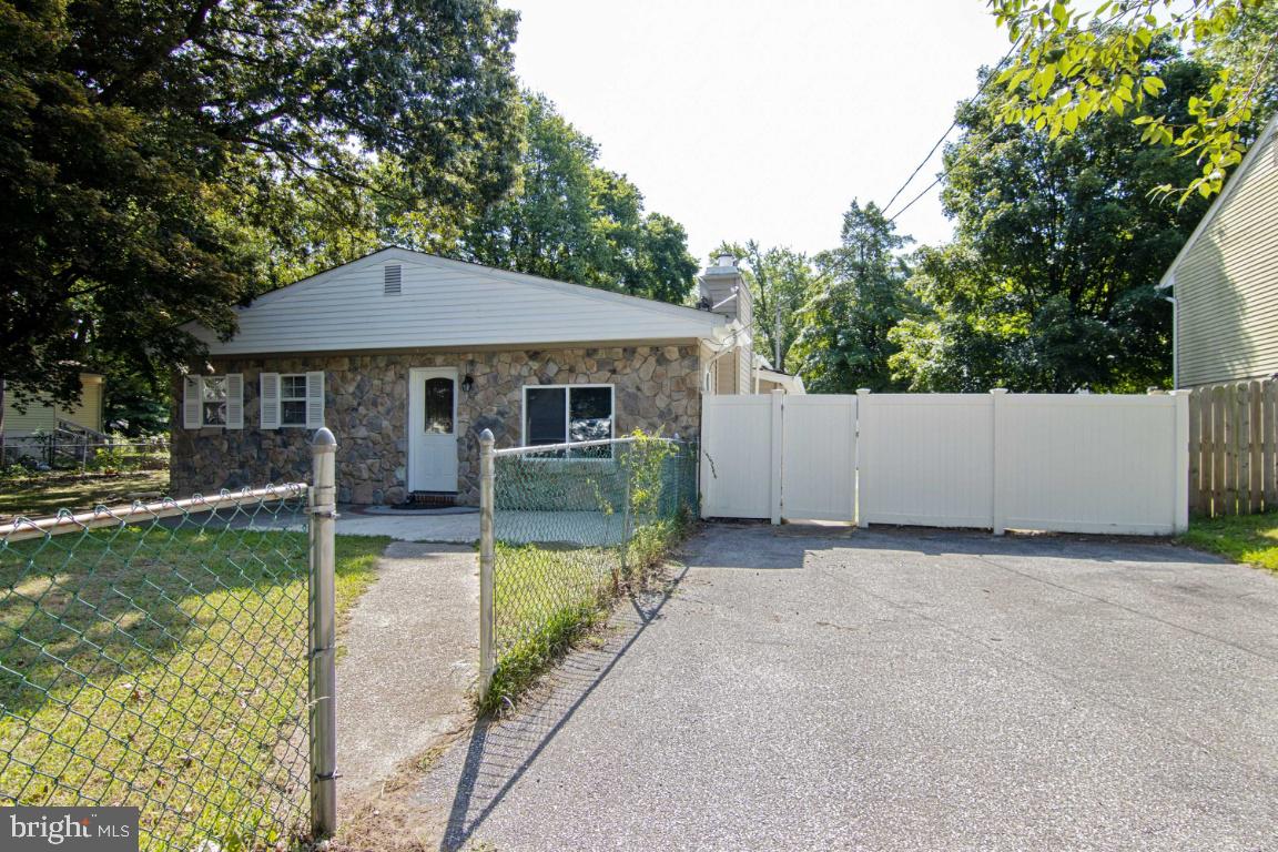 7845 Elizabeth Road Pasadena, MD 21122 - Photo 36 of 36 Front with off street parking