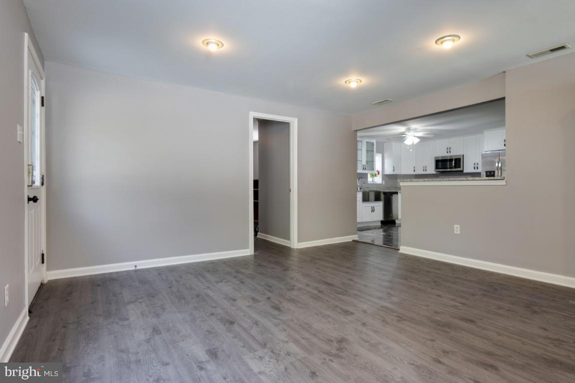 7845 Elizabeth Road Pasadena, MD 21122 - Photo 5 of 36 Living Room with beautiful floors