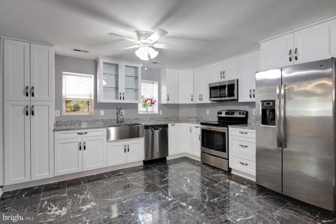 7845 Elizabeth Road Pasadena, MD 21122 - Photo 6 of 36 Update Kitchen with marble floors