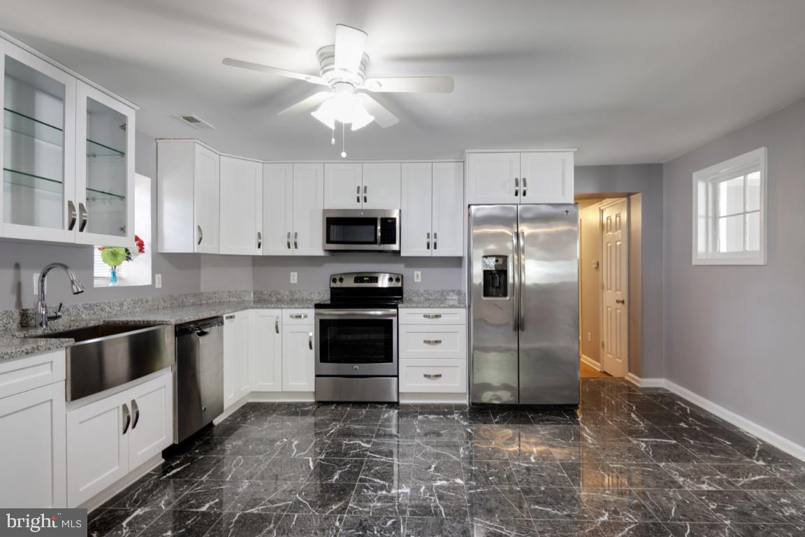 7845 Elizabeth Road Pasadena, MD 21122 - Photo 7 of 36 Updated kitchen with stainless steel applicances