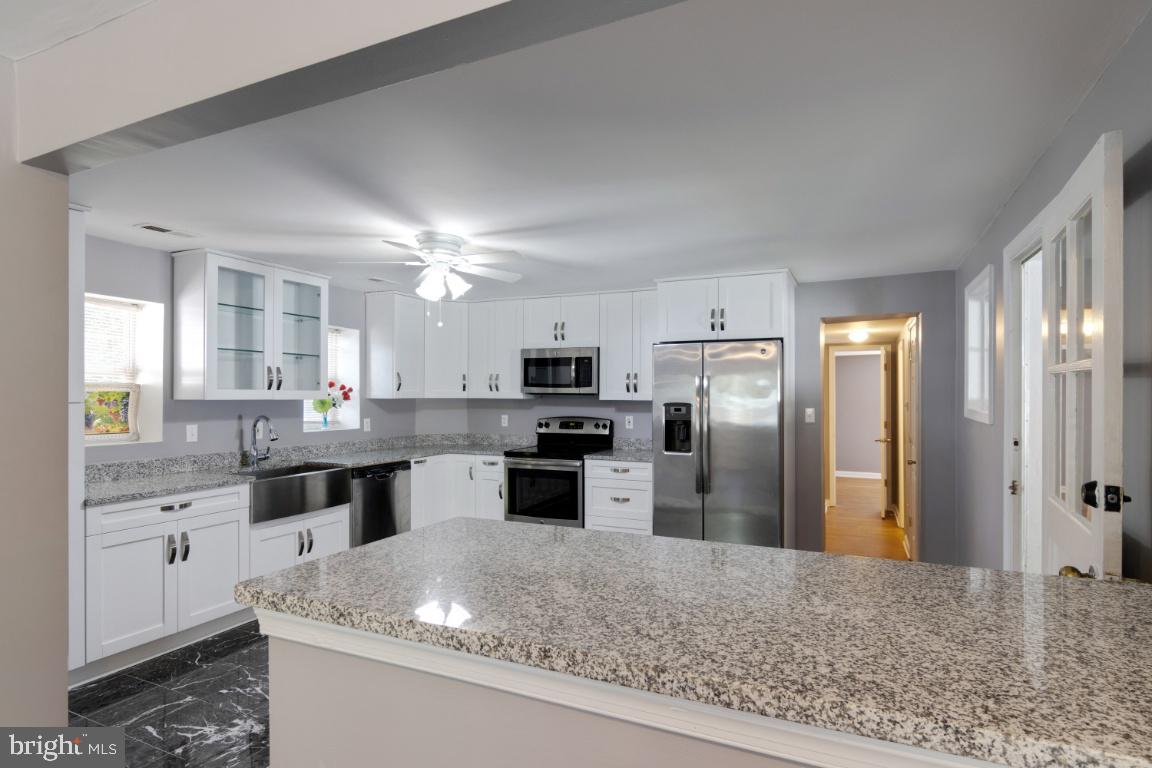 7845 Elizabeth Road Pasadena, MD 21122 - Photo 8 of 36 Kitchen with granite counter tops