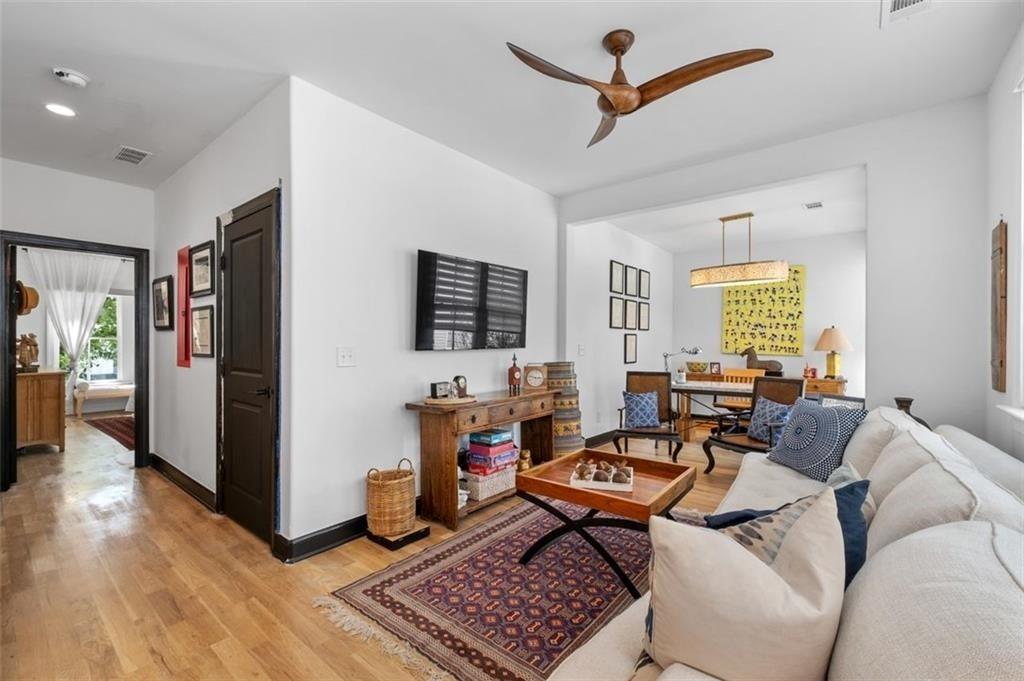 518 Bismark Road Northeast Atlanta, GA 30324 - Photo 15 of 23 a living room with furniture a window and a flat screen tv