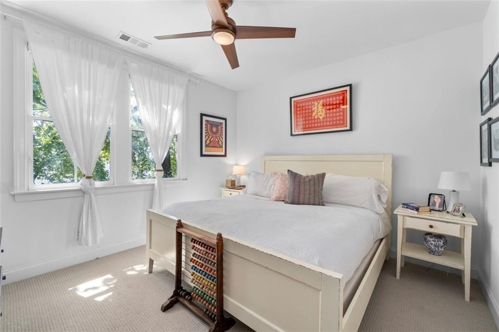 518 Bismark Road Northeast Atlanta, GA 30324 - Photo 22 of 23 a bedroom with a bed and a window