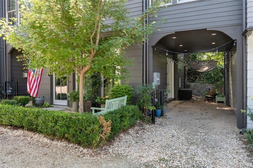 518 Bismark Road Northeast Atlanta, GA 30324 - Photo 23 of 23 a view of a patio with table and chairs and potted plants