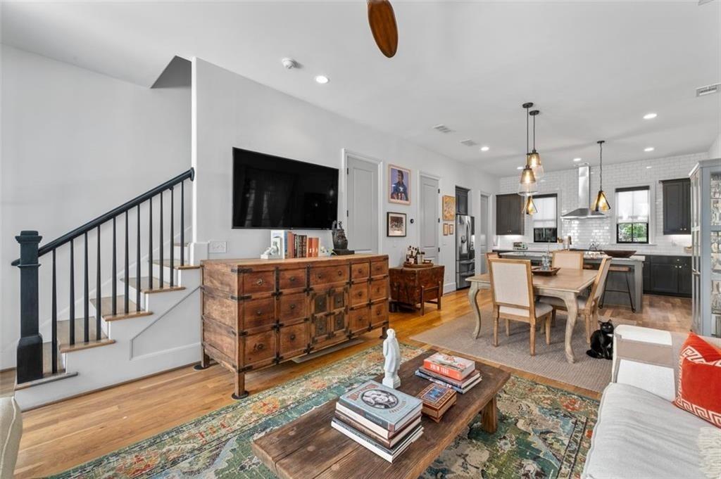 518 Bismark Road Northeast Atlanta, GA 30324 - Photo 4 of 23 a living room with furniture and a flat screen tv
