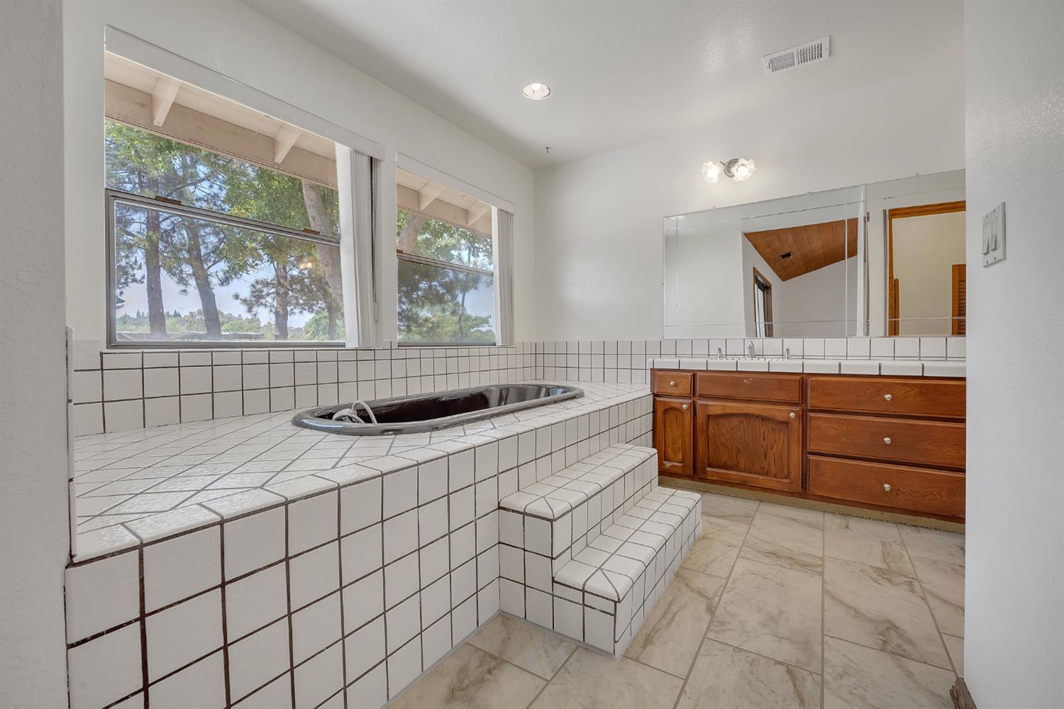 5990 Barton Road Loomis, CA 95650 - Photo 22 of 67 a kitchen with a sink and cabinets