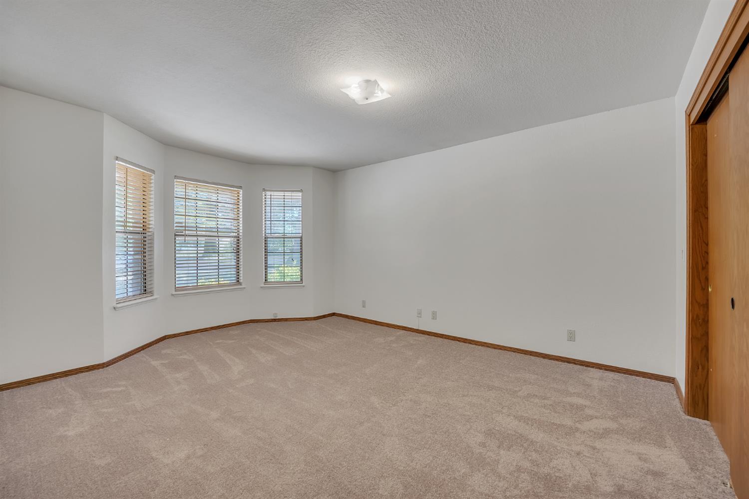 5990 Barton Road Loomis, CA 95650 - Photo 26 of 67 an empty room with windows