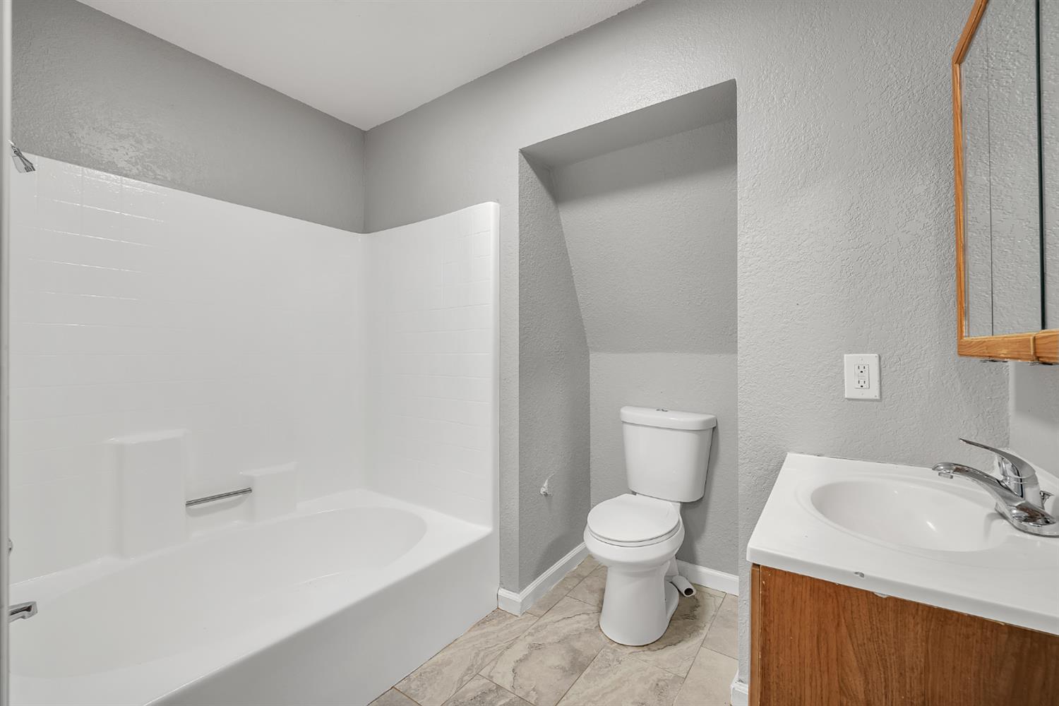 5990 Barton Road Loomis, CA 95650 - Photo 45 of 67 a bathroom with a sink a toilet and shower