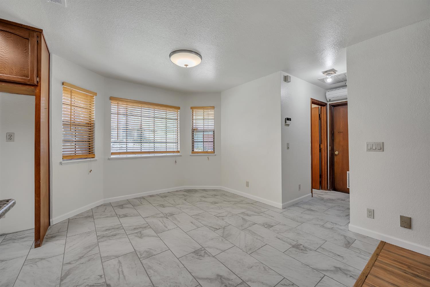 5990 Barton Road Loomis, CA 95650 - Photo 10 of 67 an empty room with windows and closet