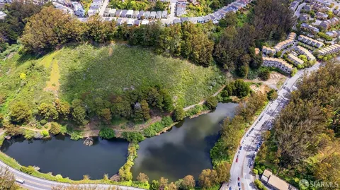 a view of a lake from a yard
