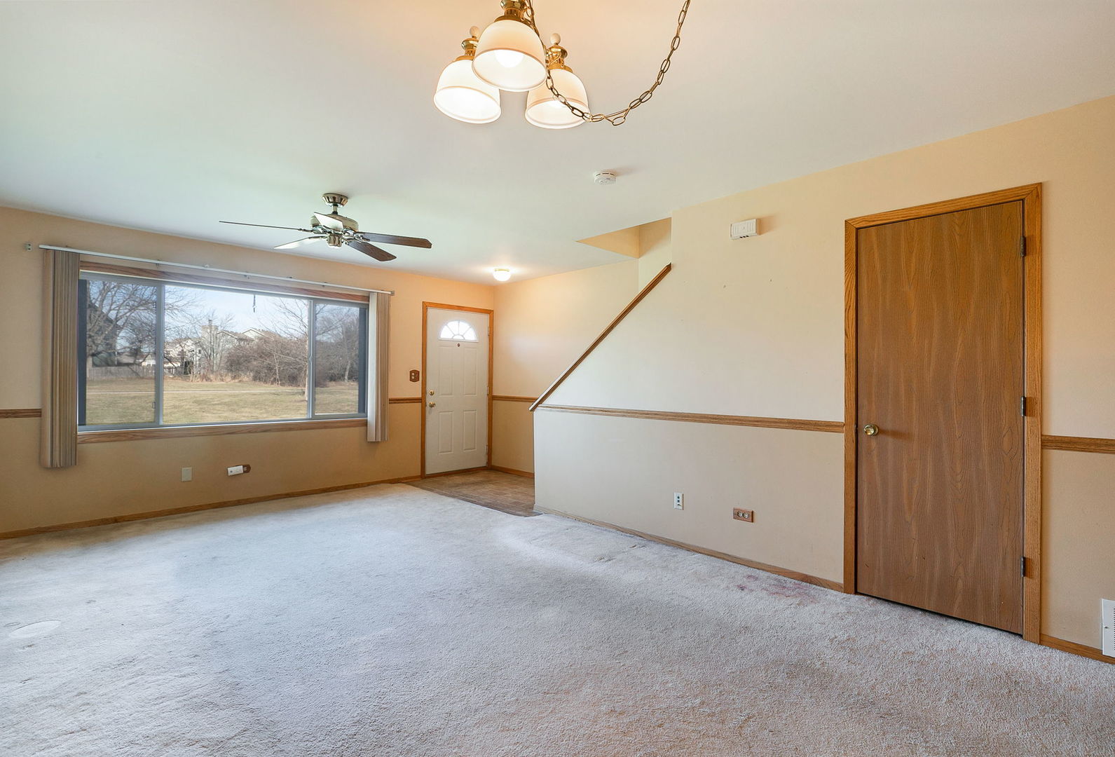 17475 Chestnut Lane Gurnee, IL 60031 - Photo 2 of 17 a view of an empty room with a window
