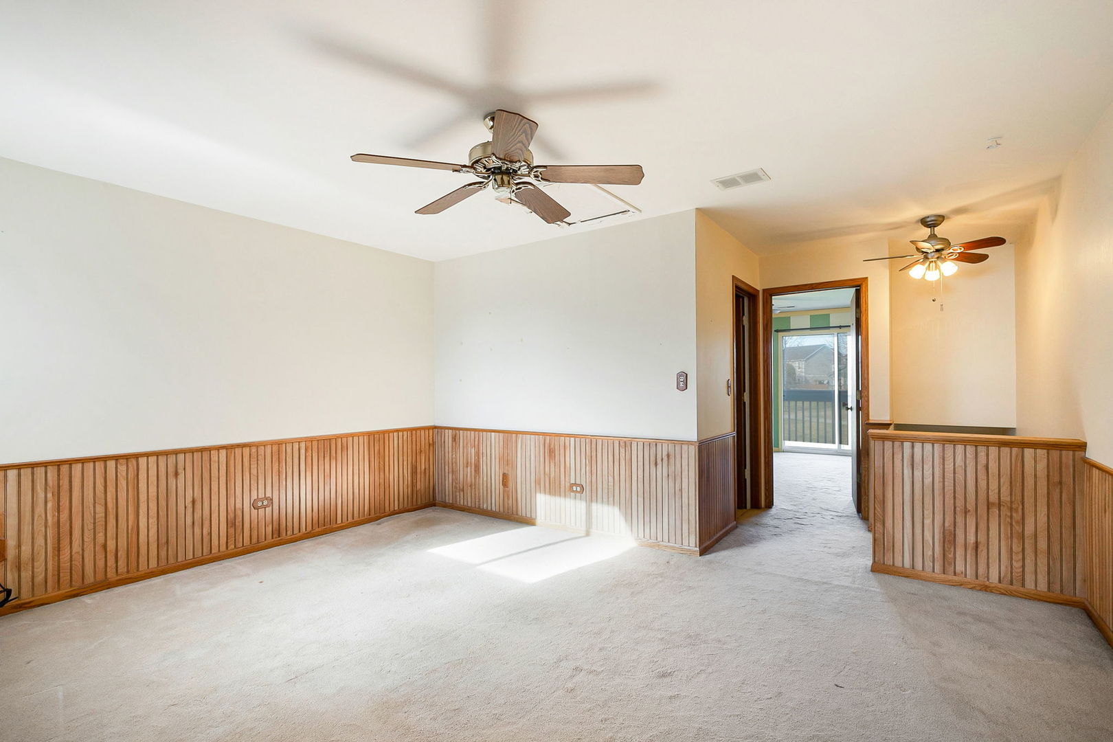 17475 Chestnut Lane Gurnee, IL 60031 - Photo 10 of 17 a view of a room with a ceiling fan