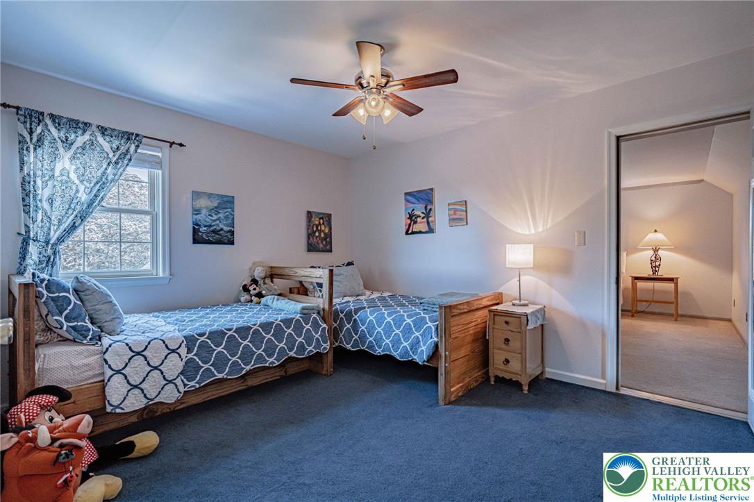 4542 Springfield Drive Coplay, PA 18037 - Photo 47 of 89 Two individual beds offer versatile sleeping arrangements in this comfortable bedroom.