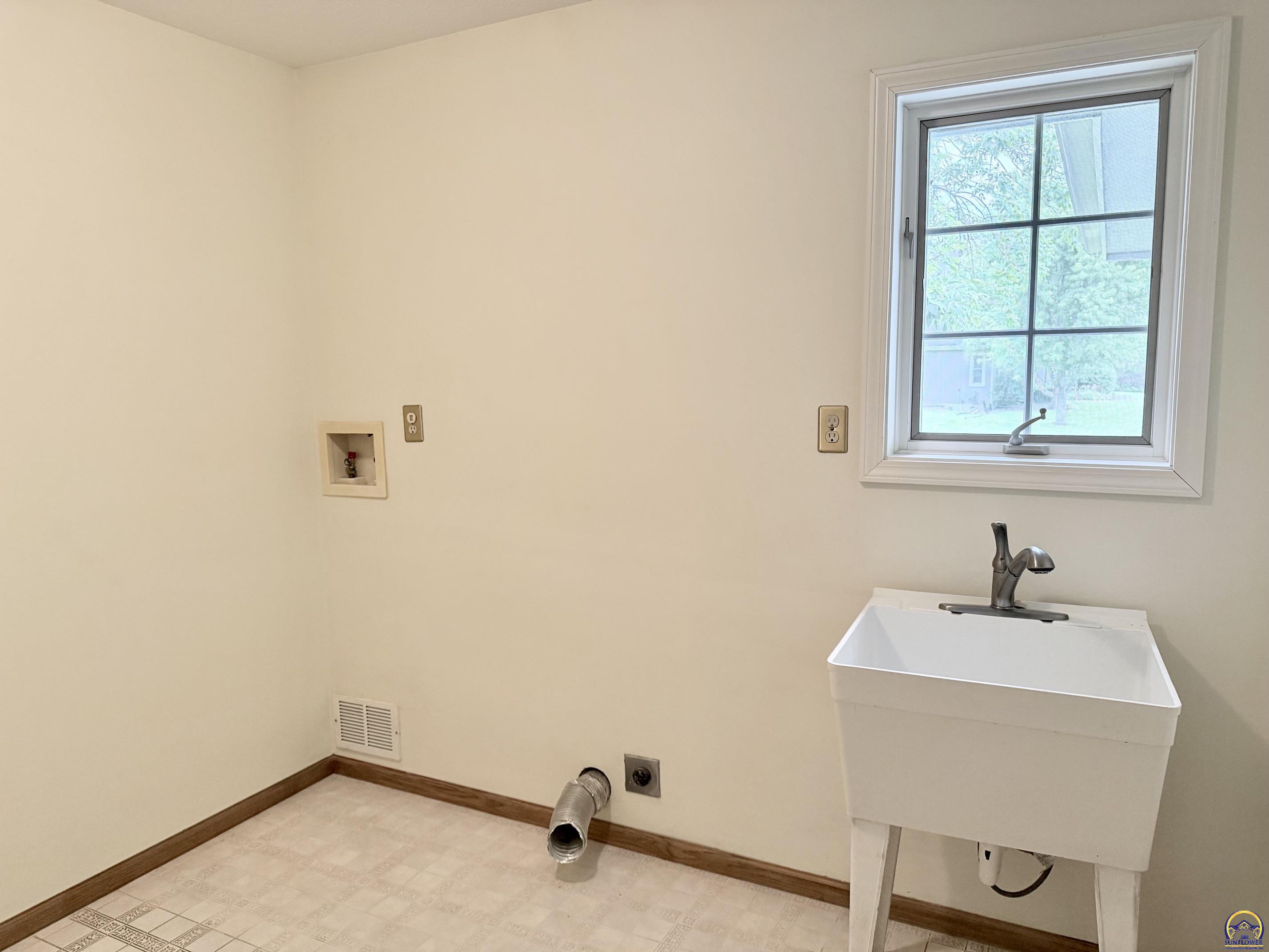 2027 Southwest West Trail Road Topeka, KS 66615 - Photo 24 of 56 Main Floor Laundry Room.