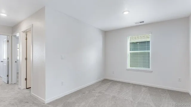 an empty room with a window