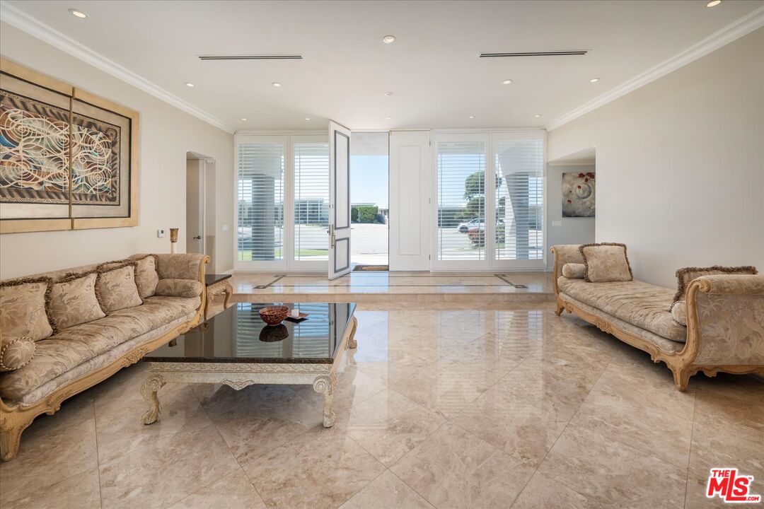 1975 Deermont Road Glendale, CA 91207 - Photo 3 of 42 a living room with furniture and a large window